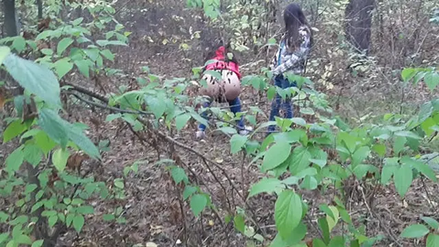 one girl pissed in the woods and the second girl gave her oral😜