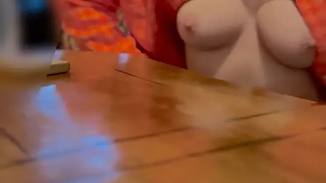 she strips and sips coffee in a cafe without a bra