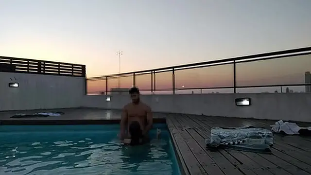 hot cumshot in the pool under a stunning sunset - wild escapade