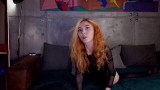 Smoking baby spreads her legs and caresses her pussy in close-up