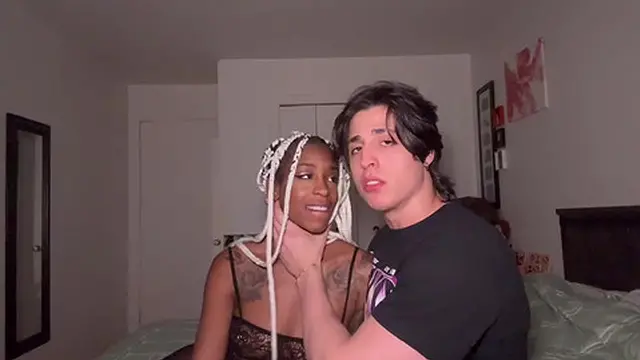 Dark ebony surrender to her dominant lover′s control