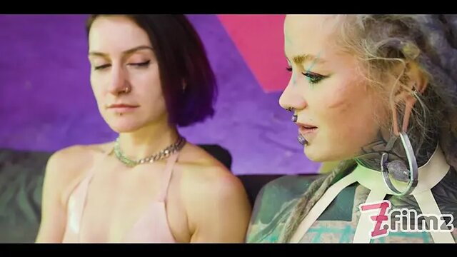 Tattooed girl Anuskatzz gapes her ass with a double steel dildo